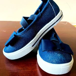 Easy on, Mary Jane toddler girl shoes.  Denim/sparkles and a pretty bow on top.
